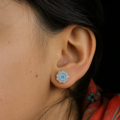Elegant sunflower chandi studs in 925 silver with white stone. for daily wear earrings