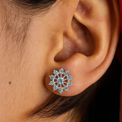 Mini snowflake white zircon 925 silver stud earrings, hypoallergenic and lightweight for lobe or cartilage piercings in Pakistan

