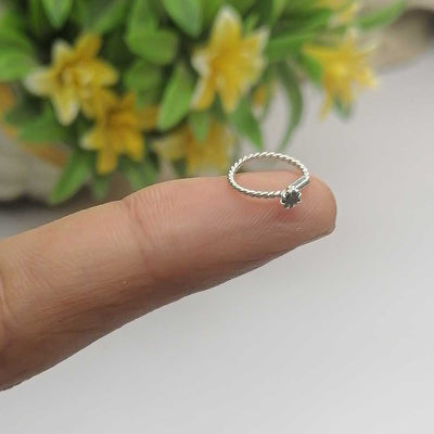 stylish twisted nose ring with black stone
