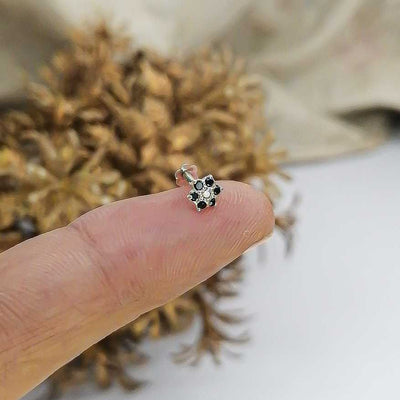 black tiny flower nose pin with screw back design
