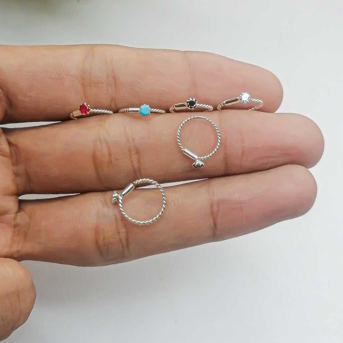 re, black, white and ferozi stone silver nosering for college girls
