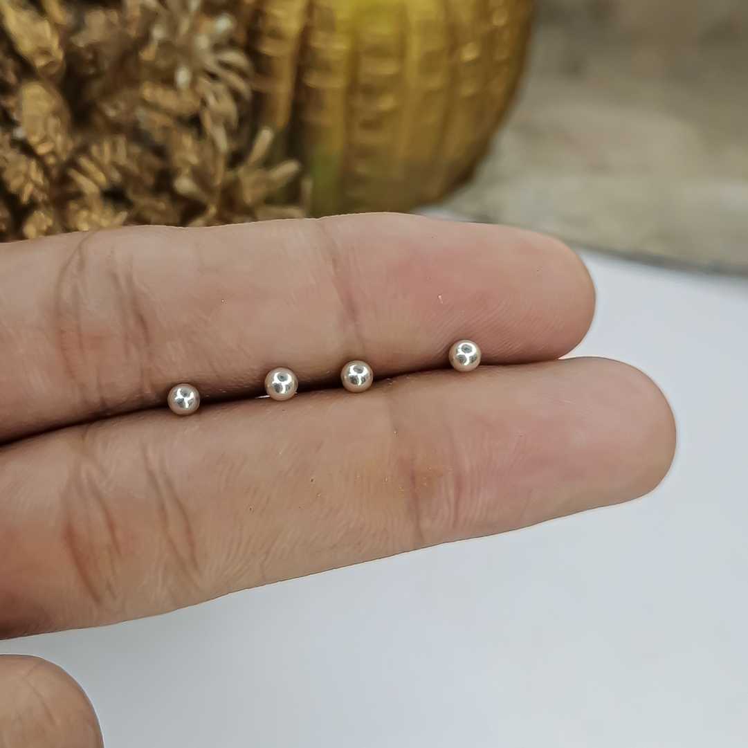 silver tiny ball earrings tragus piercing design