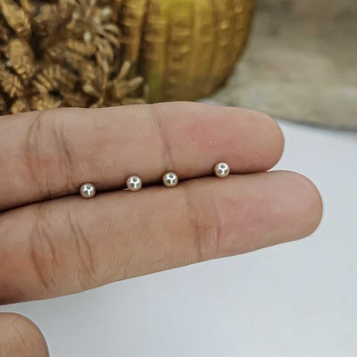 silver tiny ball earrings tragus piercing design