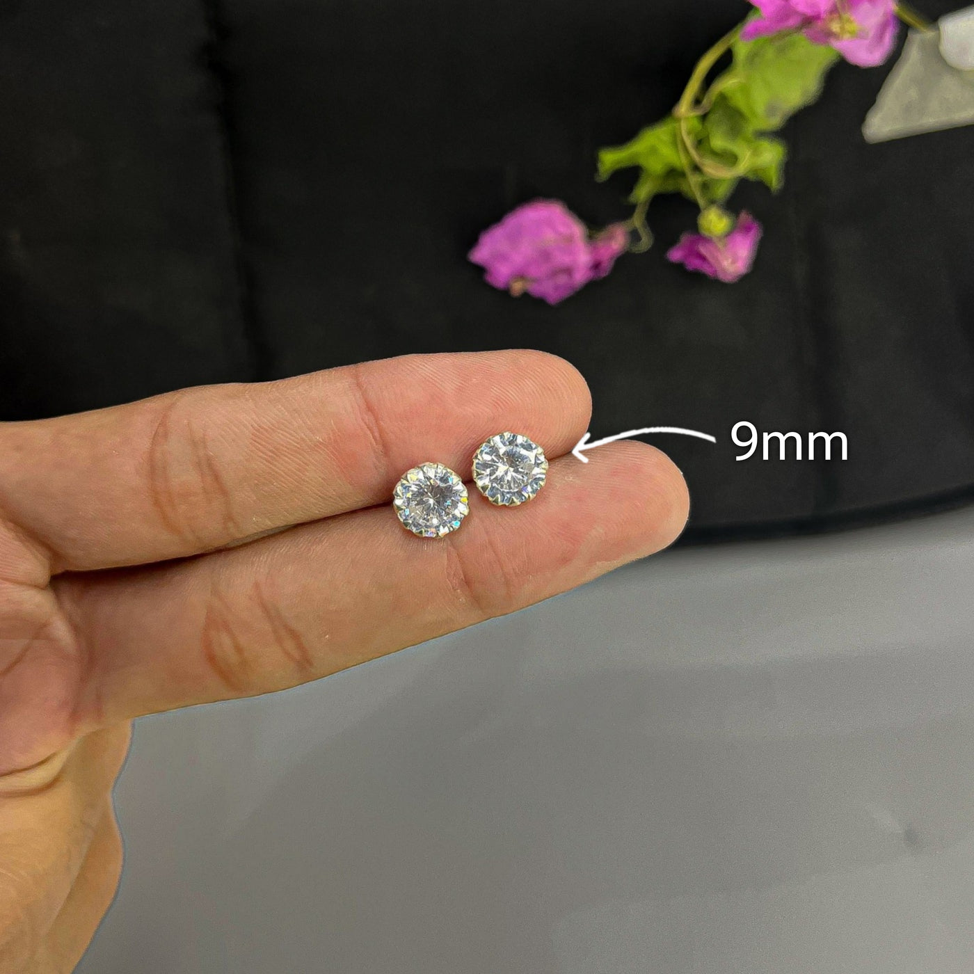 Close-up of 9mm 925 silver Chandi screw stud earring for lobe piercing

