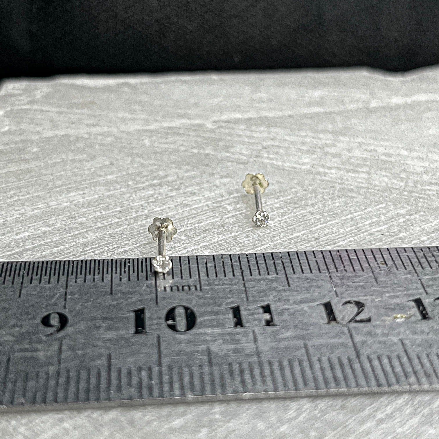 tiny stud worn with hijab friendly look