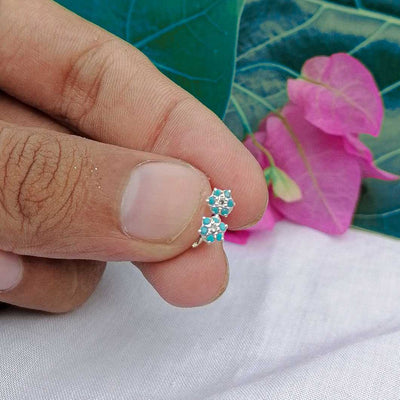 anti-tarnish silver studs with ferozi stones for lobe piercings

