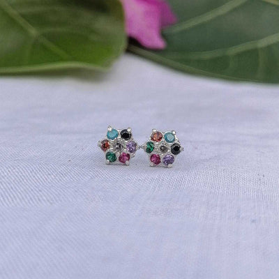Pastel flower earrings displayed in a row soft colors for sensitive ears