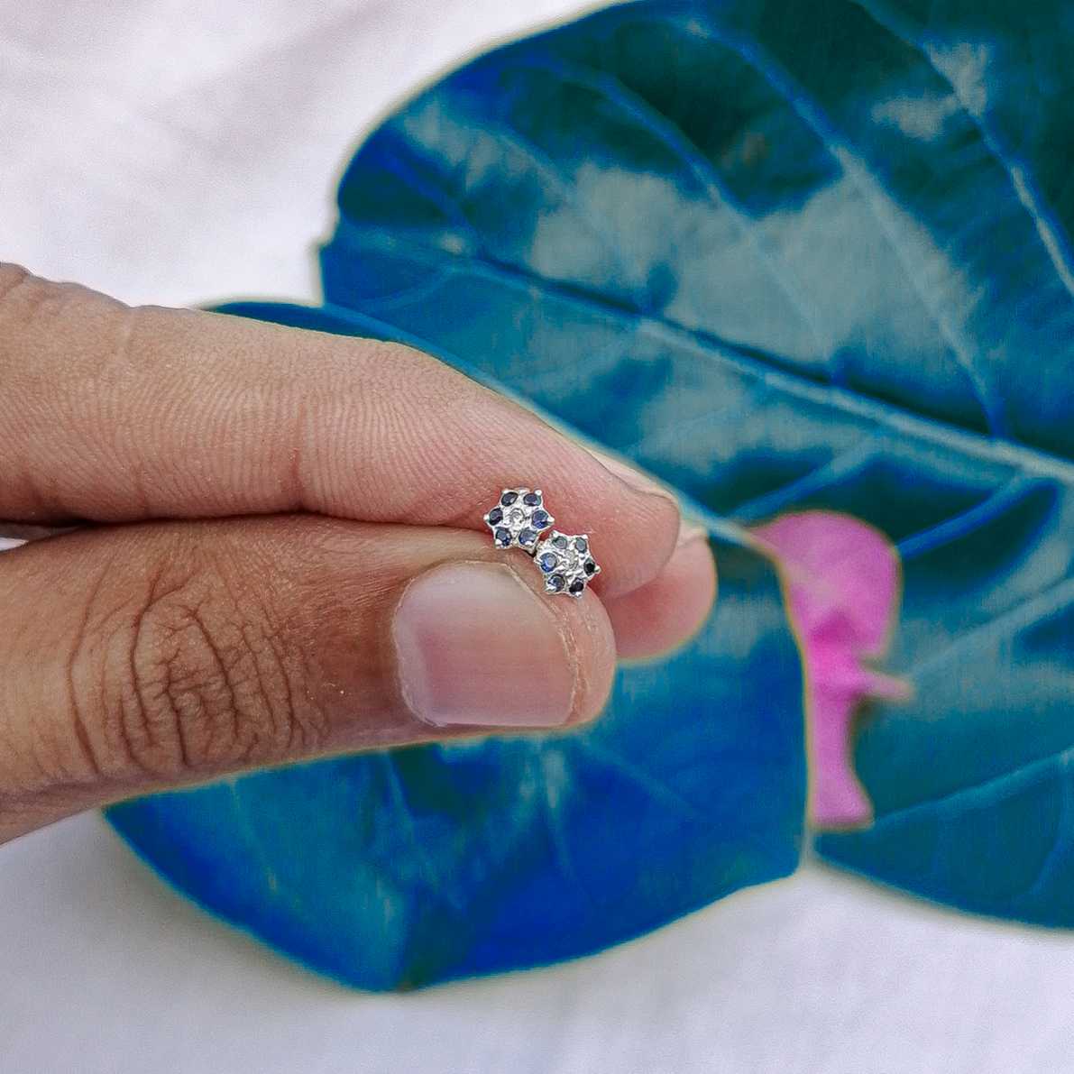 5mm blue flower stud worn on helix piercing


