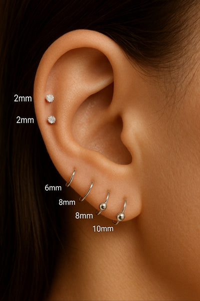 Close-up of ball stud in helix ear piercing