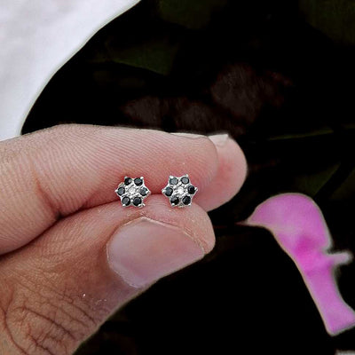Minimalist black flower stud layer styling