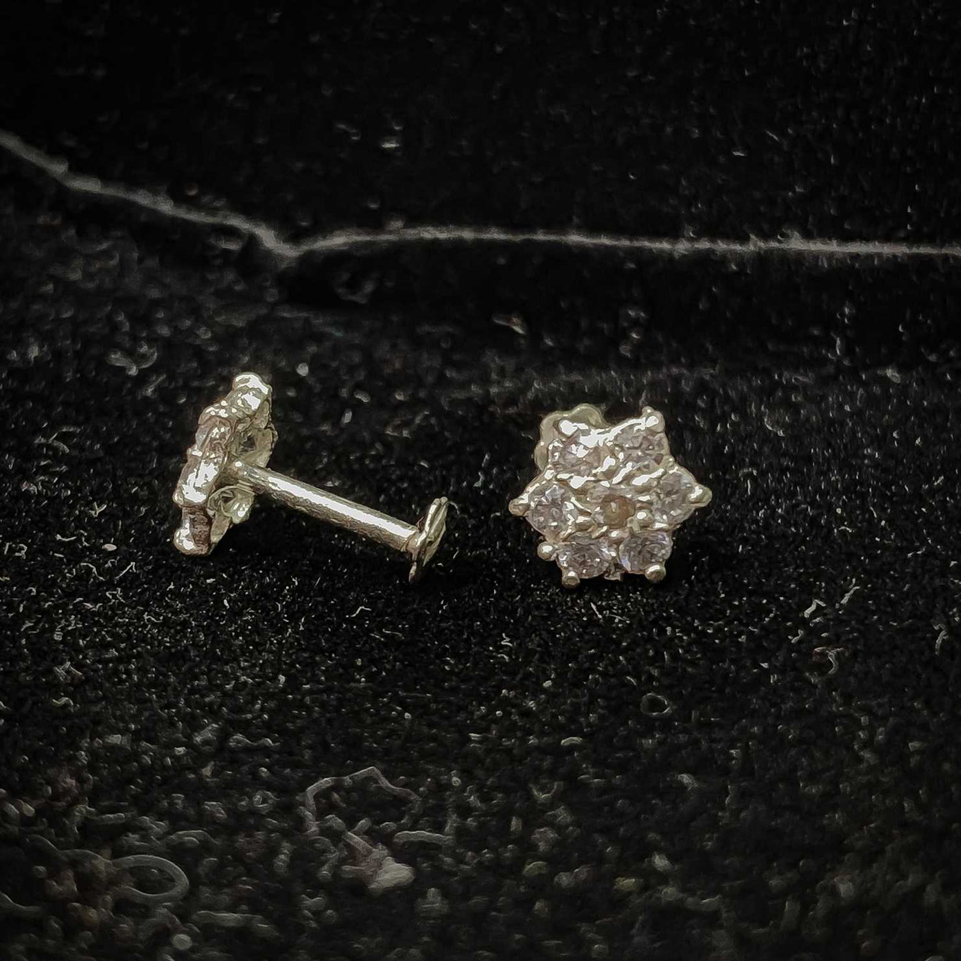 Tiny flower zircon studs with secure screw back, perfect for lobe, helix, tragus piercing in Pakistan
